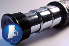 rhode-island map icon and a telescope eyepiece