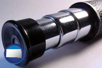 a telescope eyepiece - with South Dakota icon